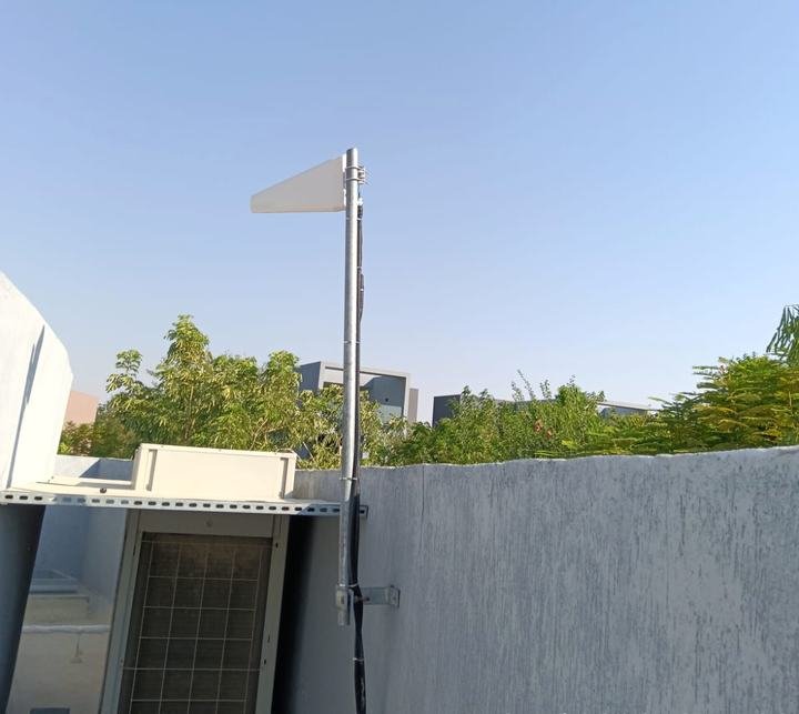 Donor antenna on a rooftop pole