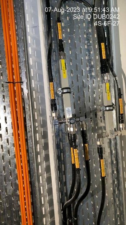 Vertical cable ladder with feeders