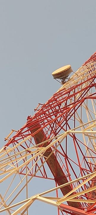 Microwave dish on a lattice tower